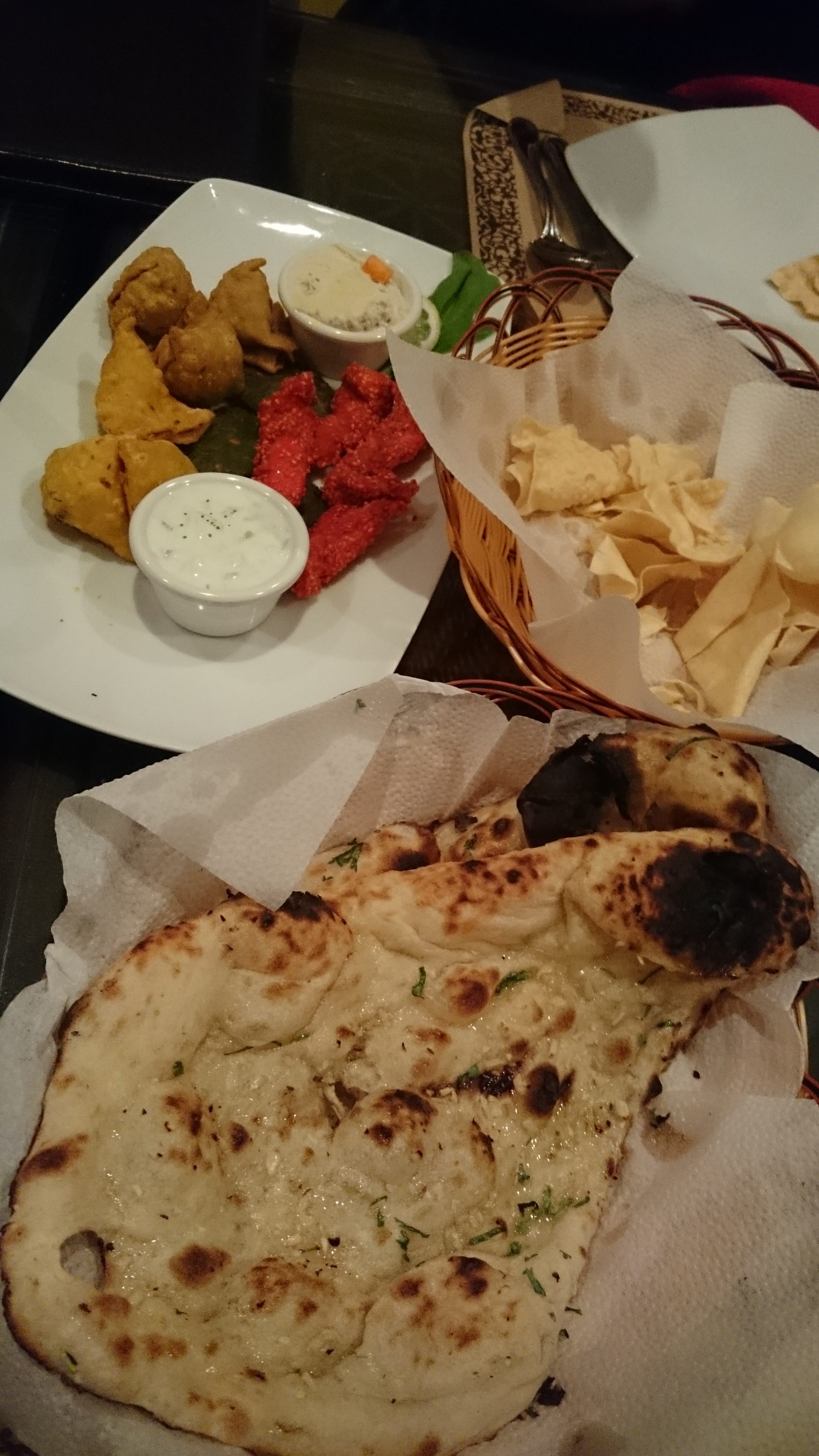 Papadums, mixed starters and naan at the Copper Chandni, Riyadh